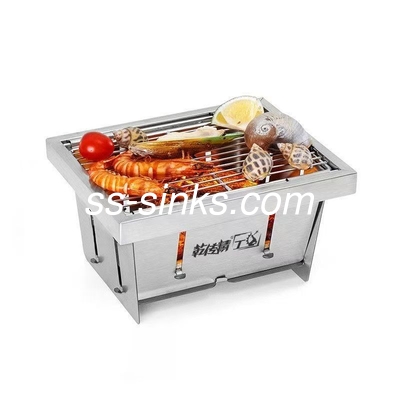 Un barbecue à charbon portable avec allumage électronique